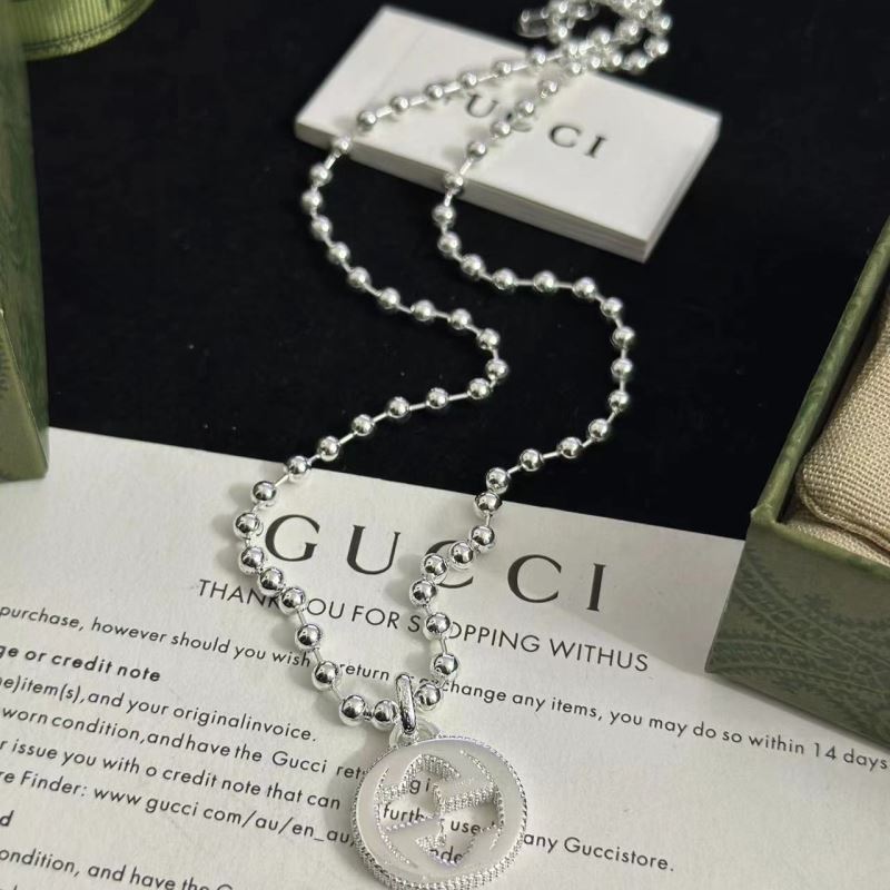G*u*i necklaces